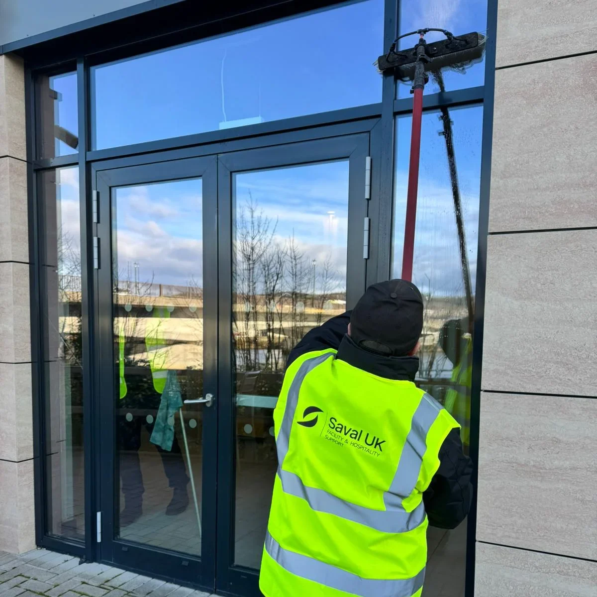 Saval UK exterior window cleaning team at a London office building